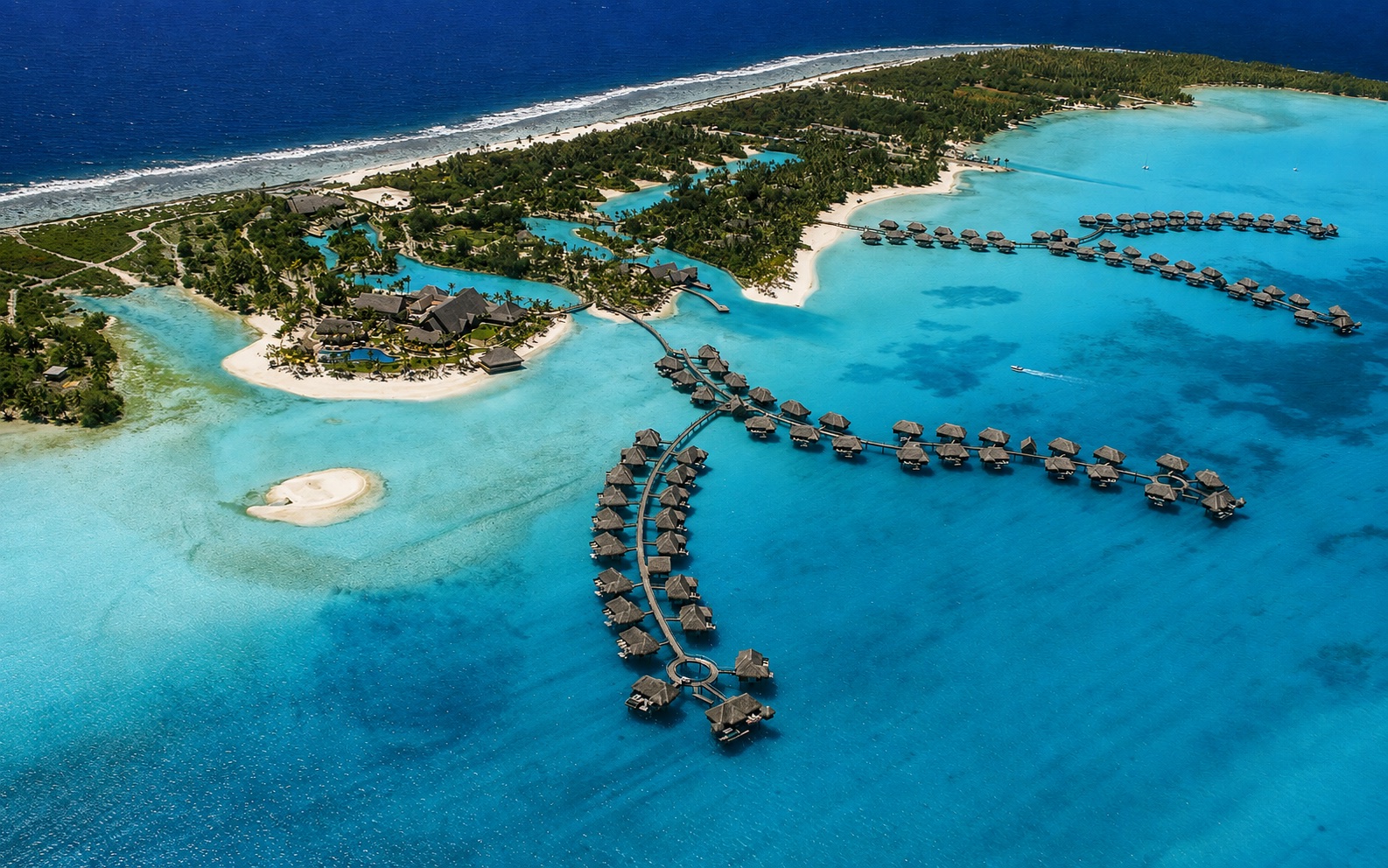 AI-enhanced view: aerial view of the Four Seasons Bora Bora resort, with overwater bungalows in a turquoise lagoon.